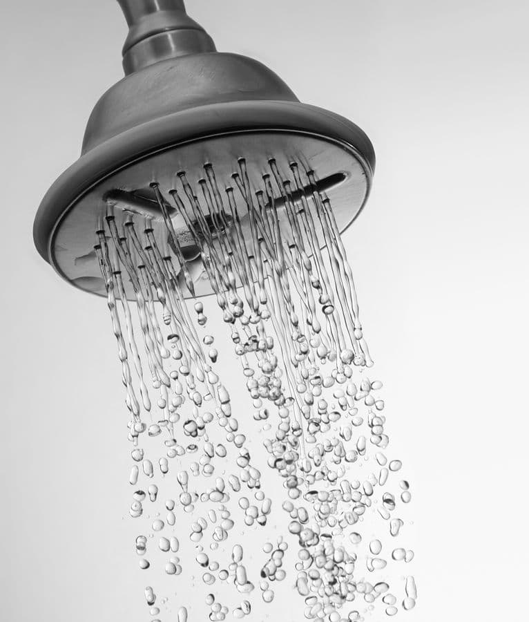 Water running from a shower head.
