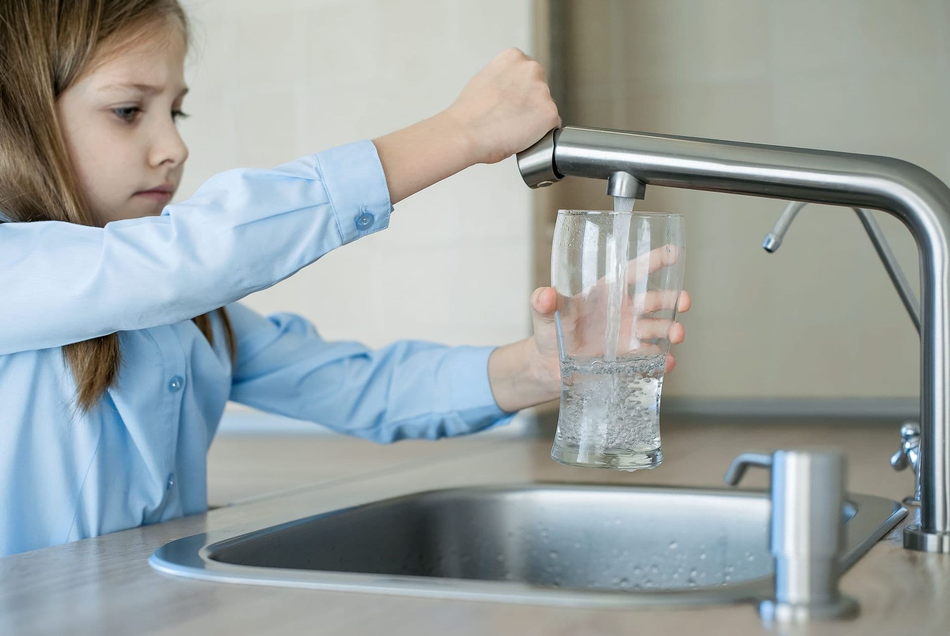 fewa-main-imgi_6_bigstock-Child-Open-Water-Tap-Kitchen-405806033-scaled.jpg
